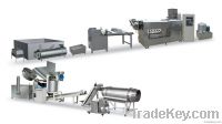 Extrusion snack processing line