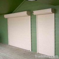 Auto rolling garage door