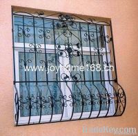 High class black ornamental wrought iron window grill