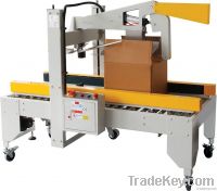 Automatic carton sealing machine