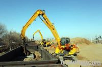 Hydraulic material handler