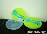 plastic salad bowl with spoon and fork