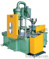 Vertical plastic injection molding machine