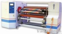 Double shaft auto interchange reinding machine