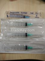 Disposable syringe with luer lock / slip