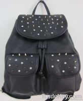 flap studded backpack