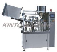 Automatic tube filling and sealing machine