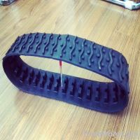 Rubber track for mini bus