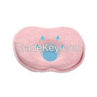 Baby head shaped pillow