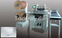 Double comb binding machine